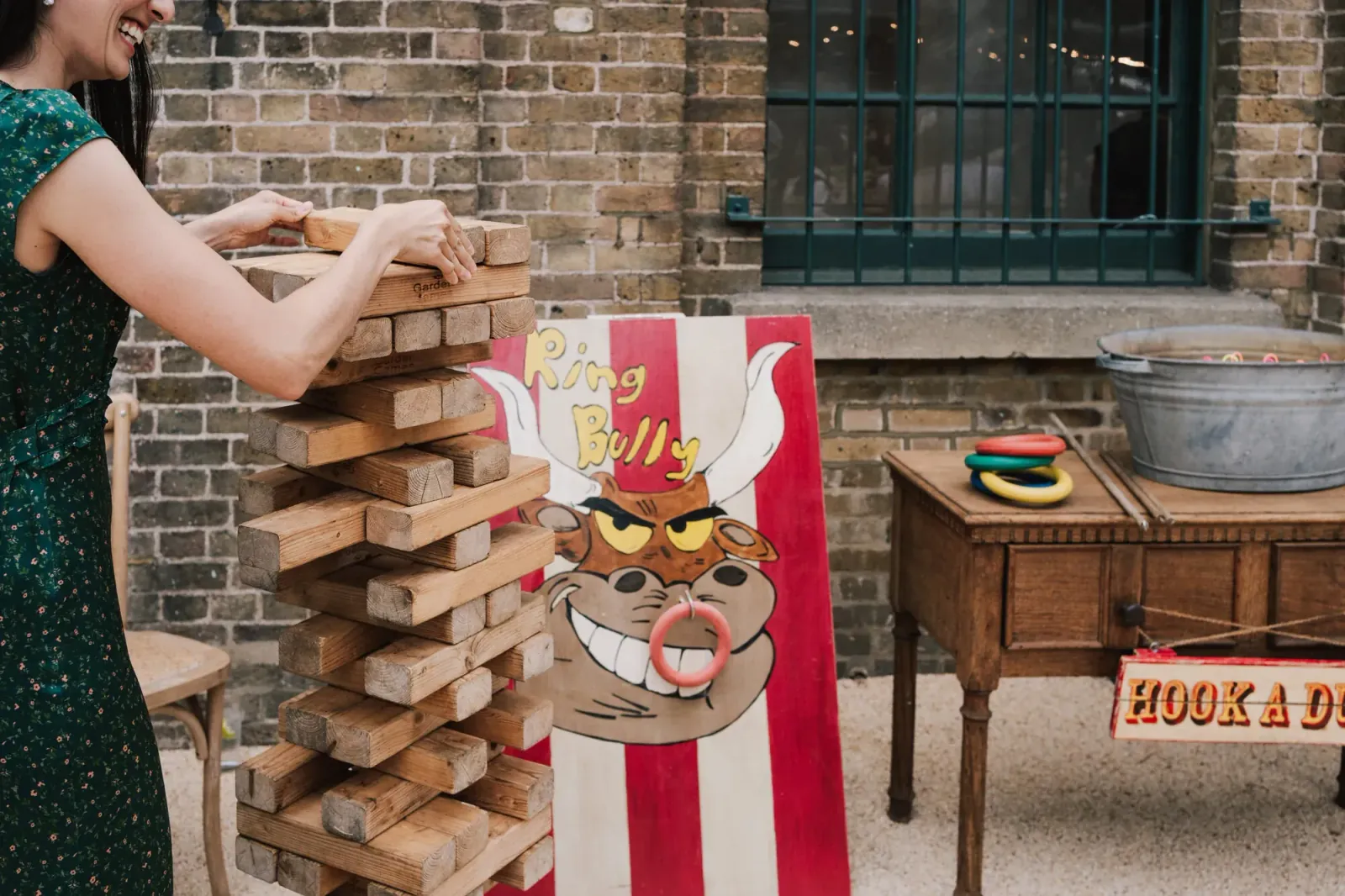 Giant Jenga and fairground games in the courtyard